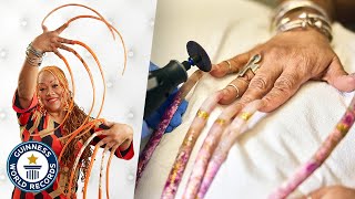 Cutting The Worlds Longest Fingernails  Guinness World Records [upl. by Femmine]