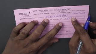 Bank se paise nikalne ka form kaise bhare  how to fill withdrawal slip in hindi [upl. by Ahsyla]