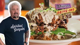 Guy Fieri Eats a Fried Chicken SMASHED Potato  Diners DriveIns and Dives  Food Network [upl. by Acie]