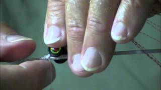 Tying a tube fly Clouser Minnow [upl. by Caputto]